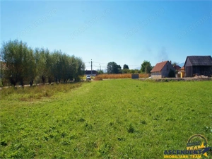 1.700mp intravilan,acces usor,intre case,ideal 2 locuinte investitie,Lunca Calnicului