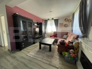 Casă familială bine compartimentată cu garaj dublu