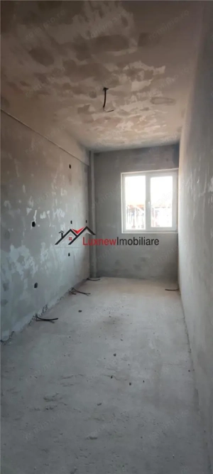 Apartament decomandat, semifinisat 37 mp plus terasa10 mp ,etaj retras. - imagine 5 Apartament decomandat, semifinisat 37 mp plus terasa10 mp ,etaj retras. - imagine 5