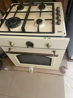 Vand aragaz cu plita Beko