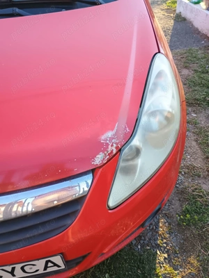 Opel Corsa D 1.3 dti - imagine 6