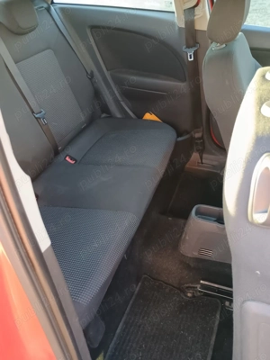 Opel Corsa D 1.3 dti - imagine 7