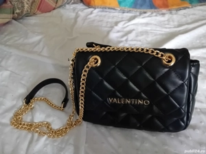   geanta ocarina crossbody Valentino folosița doar odată