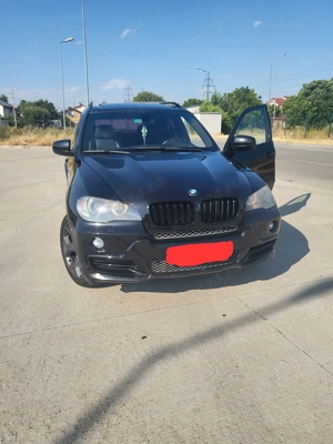 X5 e 70  BMW 3 l 235 cp