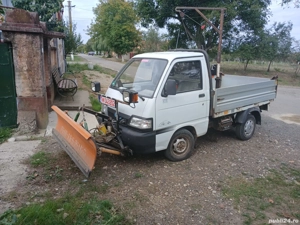 camioneta basculabila cu lama si macara