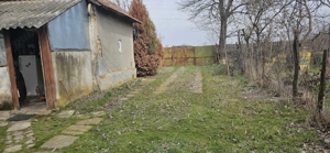 Casă bătrâneasca și teren intravilan