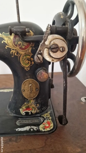 Masina de cusut Singer