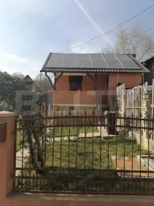  Casă renovată complet, 94 mp utili + curte 39 mp – cu panouri solare