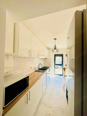 Apartament 2 camere Tunari   Otopeni - gradina + loc parcare - imagine 9