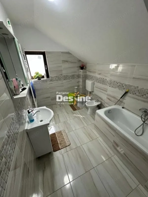 Pașcani - Vilă modernă, curte spațioasă 1000mp, terase, garaj și demisol - imagine 12