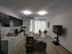 Apartament cu 3 camere, loc de parcare,centrala proprie
