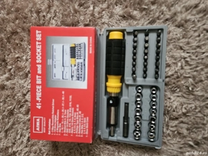 Trusă chei tubulare și capete de șurubelniță diferite.