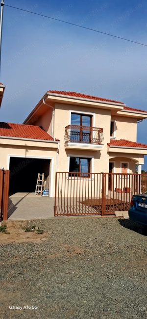 Vand casa cu garaj Dumbravita