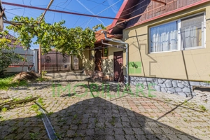 Casă primitoare în Satulung, Săcele –curte generoasă și garaj, aproape de Brașov