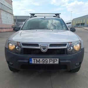 Dacia Duster 2013 benzina+GPL 4x4 1.6 16v 105cp - imagine 3 Dacia Duster 2013 benzina+GPL 4x4 1.6 16v 105cp - imagine 3