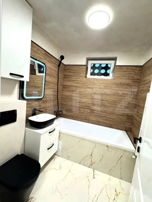 Apartament cu 3 camere, renovat complet, etaj 2, zona Tractorul