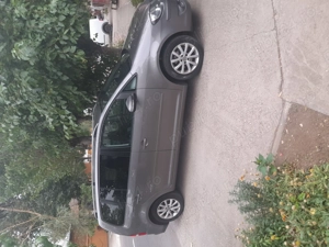 Volskwagen touran... - imagine 4