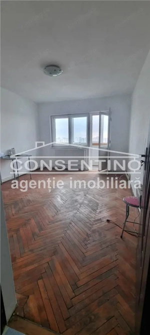 Se vinde imobil cu 2 camere , bdul N. Balcescu , liber , decomandat - imagine 8 Se vinde imobil cu 2 camere , bdul N. Balcescu , liber , decomandat - imagine 8