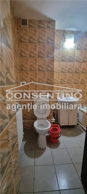 Se vinde imobil cu 2 camere , bdul N. Balcescu , liber , decomandat - imagine 2 Se vinde imobil cu 2 camere , bdul N. Balcescu , liber , decomandat - imagine 2