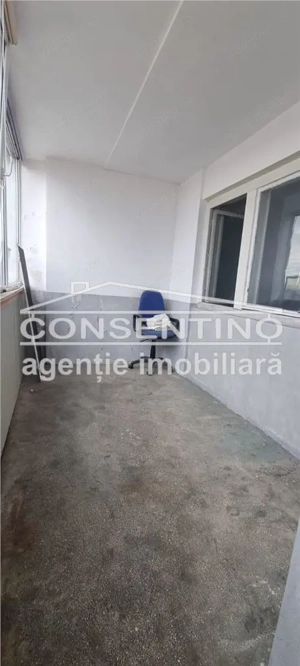 Se vinde imobil cu 2 camere , bdul N. Balcescu , liber , decomandat - imagine 10 Se vinde imobil cu 2 camere , bdul N. Balcescu , liber , decomandat - imagine 10