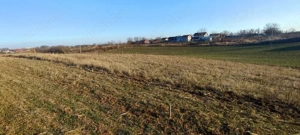 Teren 6.000 mp cu deschidere 30 m la drum asfaltat   utilități la poartă, zonă Periș, 30 min BANEASA