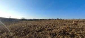 Teren 2.050 mp    la 30 min de Băneasa + utilitati + aer curat