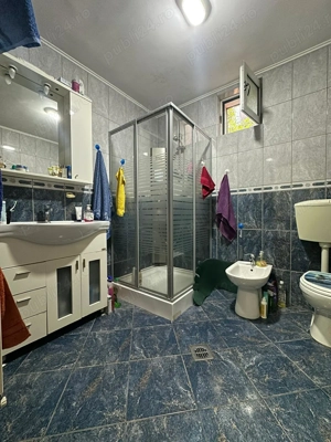 Casa individuala cu spatiu comercial in centru Popesti Leordeni - imagine 14 Casa individuala cu spatiu comercial in centru Popesti Leordeni - imagine 14