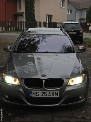 BMW e91   2010   177cai 