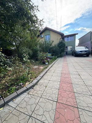 Casa individuala cu spatiu comercial in centru Popesti Leordeni - imagine 16 Casa individuala cu spatiu comercial in centru Popesti Leordeni - imagine 16