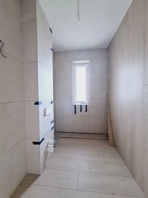 2 camere.Gradina proprie de 47 mp.Decomandat. - imagine 11