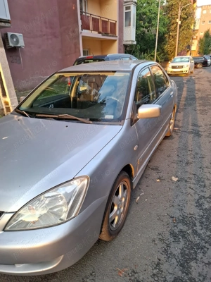 Vând mitsubishi lancer