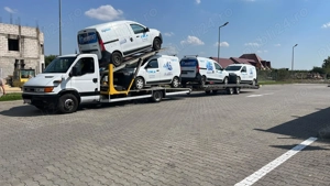 Transport auto pe platforma