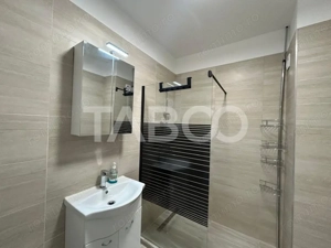 Garsoniera la prima inchiriere cu balcon gradina loc parcare Selimbar  - imagine 6 Garsoniera la prima inchiriere cu balcon gradina loc parcare Selimbar  - imagine 6