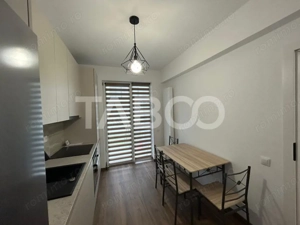 Garsoniera la prima inchiriere cu balcon gradina loc parcare Selimbar  - imagine 4 Garsoniera la prima inchiriere cu balcon gradina loc parcare Selimbar  - imagine 4