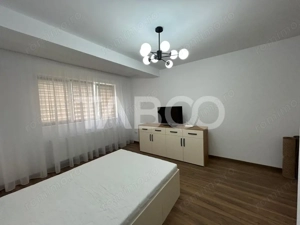 Garsoniera la prima inchiriere cu balcon gradina loc parcare Selimbar  - imagine 8 Garsoniera la prima inchiriere cu balcon gradina loc parcare Selimbar  - imagine 8