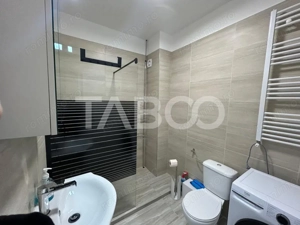 Garsoniera la prima inchiriere cu balcon gradina loc parcare Selimbar  - imagine 10 Garsoniera la prima inchiriere cu balcon gradina loc parcare Selimbar  - imagine 10