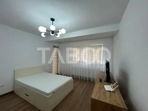 Garsoniera la prima inchiriere cu balcon gradina loc parcare Selimbar  - imagine 2 Garsoniera la prima inchiriere cu balcon gradina loc parcare Selimbar  - imagine 2