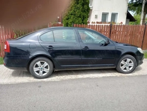 Skoda Octavia 2011 + 4 roti cu anvelope de iarna - imagine 3