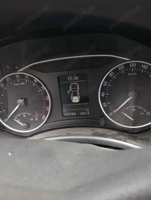 Skoda Octavia 2011 + 4 roti cu anvelope de iarna - imagine 6