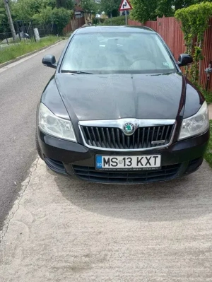 Skoda Octavia 2011 + 4 roti cu anvelope de iarna