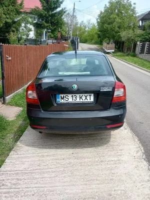 Skoda Octavia 2011 + 4 roti cu anvelope de iarna - imagine 2