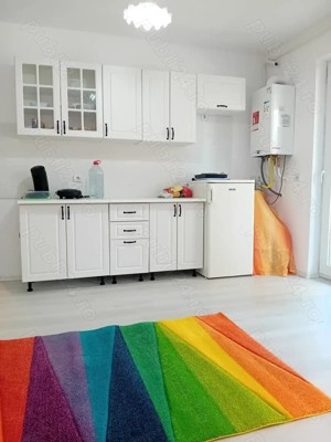 Vând apartament nou ,finisat,mobilat, 3 camere, terasa 75mp, parcare,locație excelenta - imagine 2