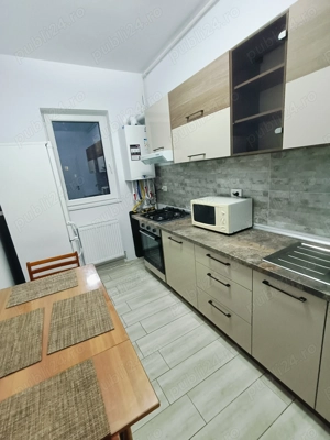 Inchiriez apartament 2 camere decomandat + 1 loc de parcare În Rotar 2 - imagine 5