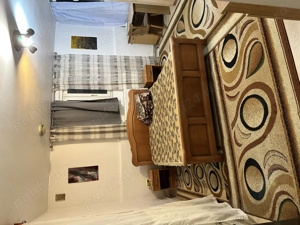 Ofer spre închiriere garsonieră confort sportit în zona centrală