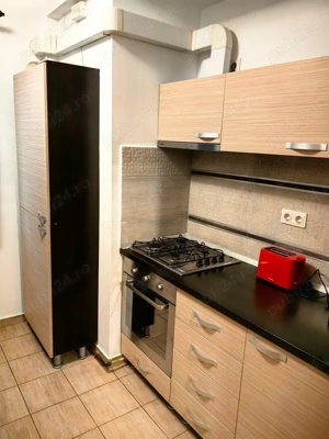 Proprietar, inchiriez apartament cu 3 camere de lux in bloc cu 4 nivele la etajul 1 - imagine 4