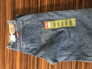 Vand doua perechi blugi Wrangler