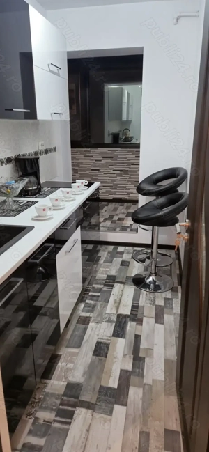 Închiriez apartament în regim hotelier  - imagine 2 Închiriez apartament în regim hotelier  - imagine 2