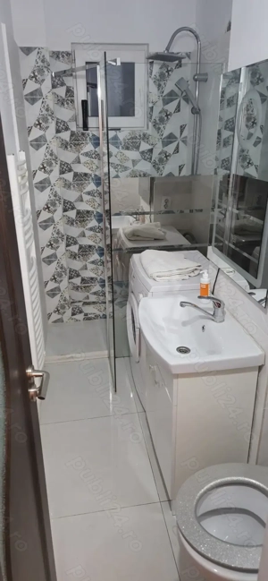 Închiriez apartament în regim hotelier  - imagine 4 Închiriez apartament în regim hotelier  - imagine 4