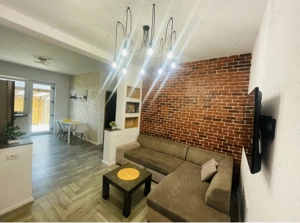 Apartament 2 camere cu grădina de inchiriat.