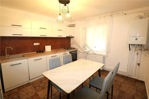 Apartament 3 camere+ 30 mp la demisol, centrala proprie in zona Modern - imagine 3